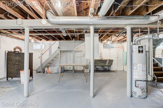 515 W Golden Gate, Detroit, MI 48203 - below grade area featuring water heater and stairs