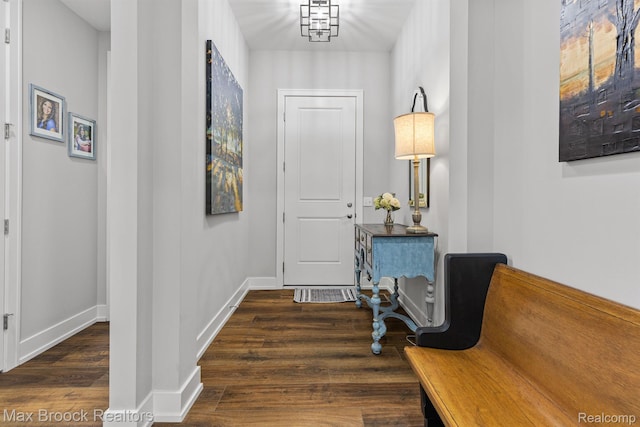17170 Garden Ridge Ln Unit 72, Northville, MI 48168 - foyer entrance featuring wood finished floors and baseboards