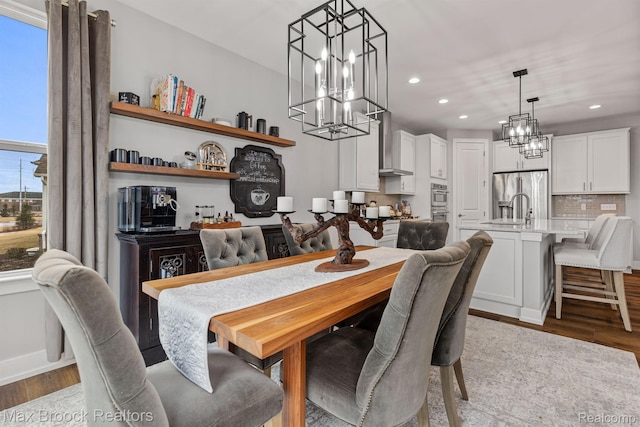 17170 Garden Ridge Ln Unit 72, Northville, MI 48168 - dining room featuring a chandelier, wood finished floors, and recessed lighting