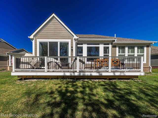 17170 Garden Ridge Ln Unit 72, Northville, MI 48168 - back of property featuring a yard and a wooden deck
