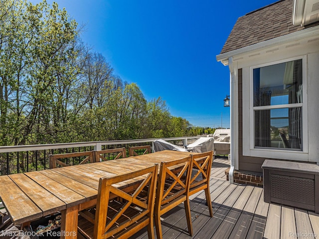 17170 Garden Ridge Ln Unit 72, Northville, MI 48168 - wooden deck featuring outdoor dining space