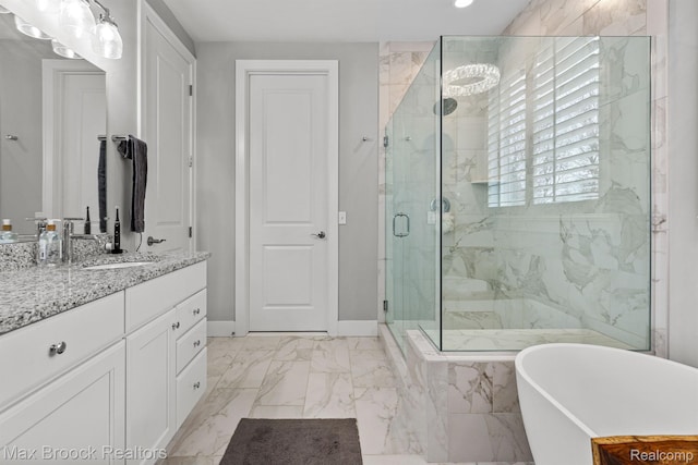 17170 Garden Ridge Ln Unit 72, Northville, MI 48168 - bathroom with a stall shower, a freestanding tub, marble finish floors, vanity, and recessed lighting