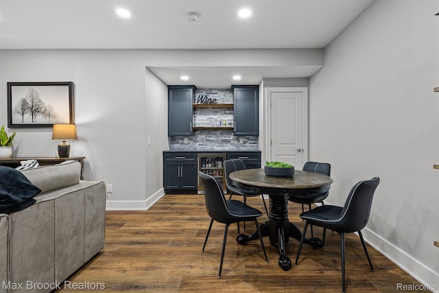 17170 Garden Ridge Ln Unit 72, Northville, MI 48168 - dining area featuring a dry bar, recessed lighting, dark wood finished floors, and wine cooler