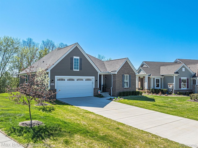 17170 Garden Ridge Ln Unit 72, Northville, MI 48168 - view of front of home with concrete driveway, brick siding, and a front lawn