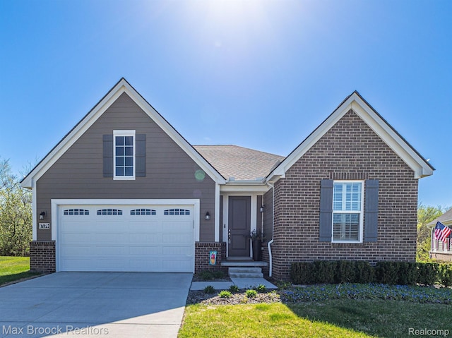 17170 Garden Ridge Ln Unit 72, Northville, MI 48168 - traditional home with brick siding, a garage, driveway, and a front yard