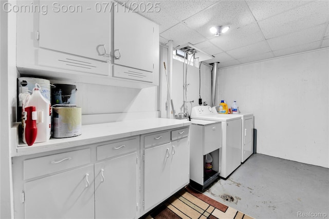 34019 Arrowhead St, Canton, MI 48185 - laundry room featuring washer and clothes dryer and cabinet space