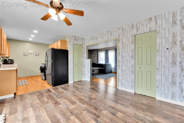 34019 Arrowhead St, Canton, MI 48185 - kitchen with freestanding refrigerator, wallpapered walls, ceiling fan, light wood-style flooring, and light brown cabinets