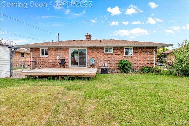 34019 Arrowhead St, Canton, MI 48185 - back of property featuring a chimney, brick siding, and a deck