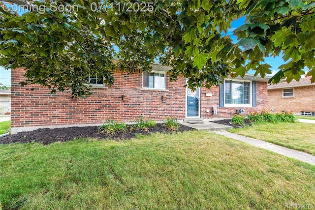 34019 Arrowhead St, Canton, MI 48185 - view of front of home featuring a front lawn and brick siding