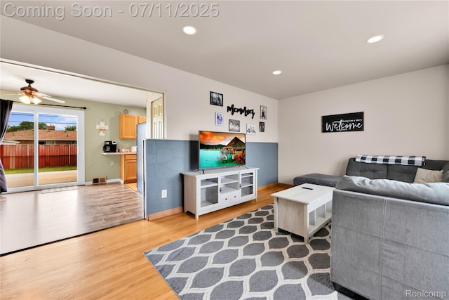 34019 Arrowhead St, Canton, MI 48185 - living room featuring light wood-style flooring, a ceiling fan, and recessed lighting