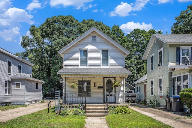 211 S 4th St, Niles, MI 49120 - view of front of home with a porch and a shingled roof