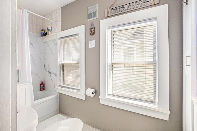 211 S 4th St, Niles, MI 49120 - full bath with healthy amount of natural light and shower / tub combo