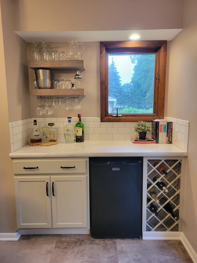 1200 Elmwood Dr, Jenison, MI 49428 - indoor dry bar with dishwasher and backsplash