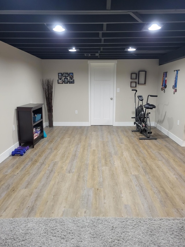 1200 Elmwood Dr, Jenison, MI 49428 - finished below grade area featuring wood finished floors and baseboards
