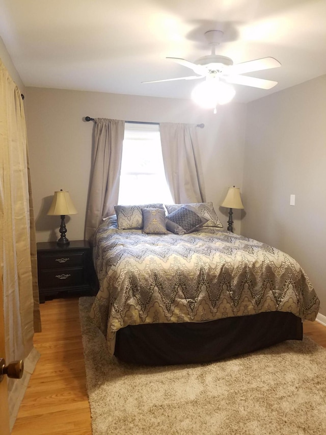 1200 Elmwood Dr, Jenison, MI 49428 - bedroom with light wood-style floors and ceiling fan