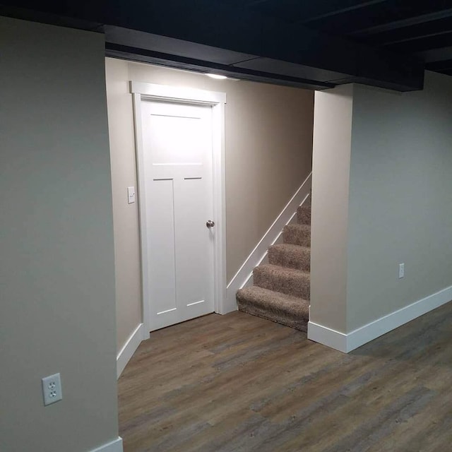 1200 Elmwood Dr, Jenison, MI 49428 - finished below grade area featuring wood finished floors and stairway