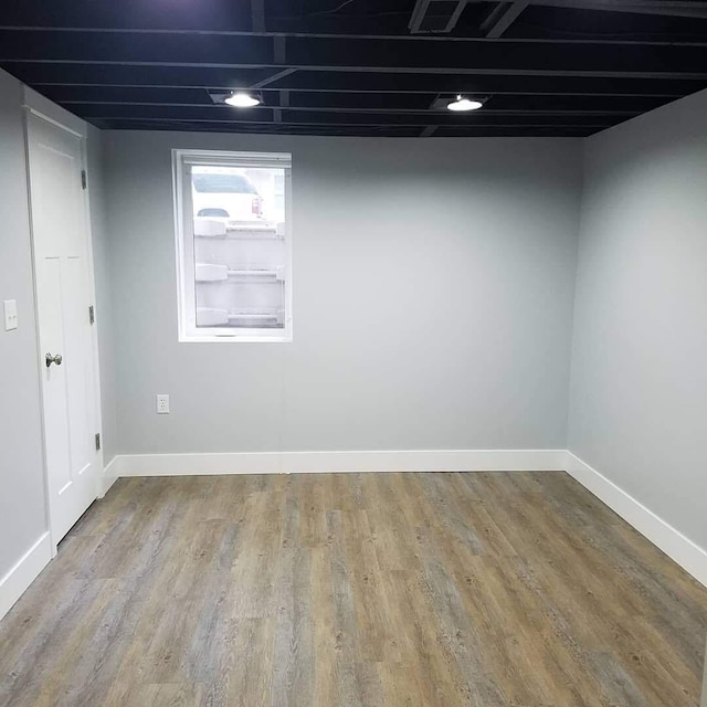1200 Elmwood Dr, Jenison, MI 49428 - finished basement featuring wood finished floors and baseboards