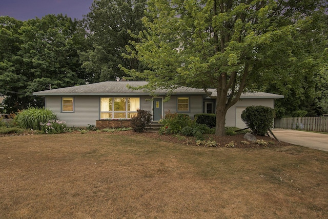 1200 Elmwood Dr, Jenison, MI 49428 - ranch-style home with driveway and a garage