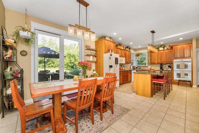 9095 Marsh Cir, Galesburg, MI 49053 - dining area featuring light tile patterned floors and recessed lighting
