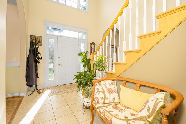 9095 Marsh Cir, Galesburg, MI 49053 - tiled entrance foyer with stairs and a towering ceiling