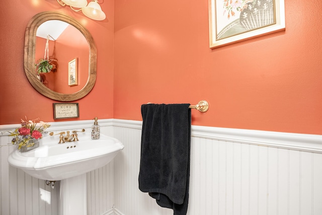 9095 Marsh Cir, Galesburg, MI 49053 - bathroom featuring wainscoting and a sink