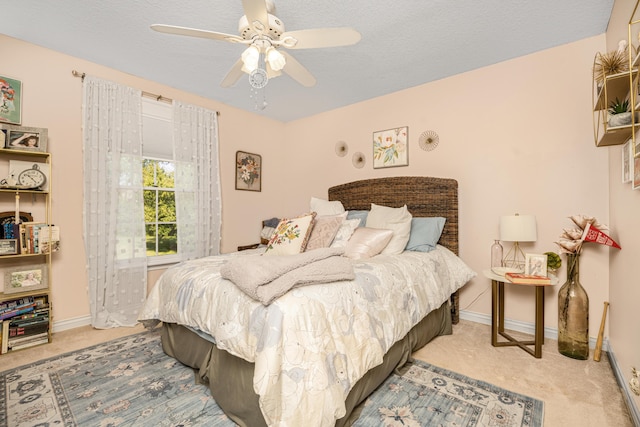 9095 Marsh Cir, Galesburg, MI 49053 - carpeted bedroom featuring baseboards and ceiling fan