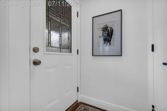 4607 Robinwood Ave, Royal Oak, MI 48073 - entryway with baseboards and dark wood finished floors