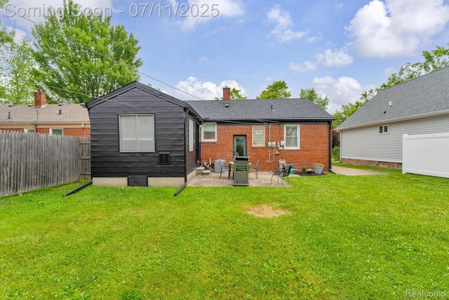 4607 Robinwood Ave, Royal Oak, MI 48073 - back of house featuring a patio area, a chimney, and brick siding