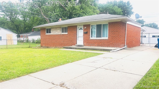 4224 Garrick Ave, Sterling Heights, MI 48091 - bungalow-style house with brick siding and a shingled roof