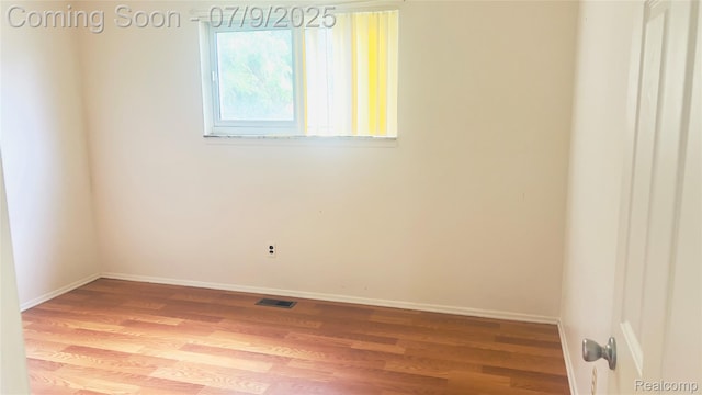 4224 Garrick Ave, Sterling Heights, MI 48091 - unfurnished room featuring light wood-style flooring