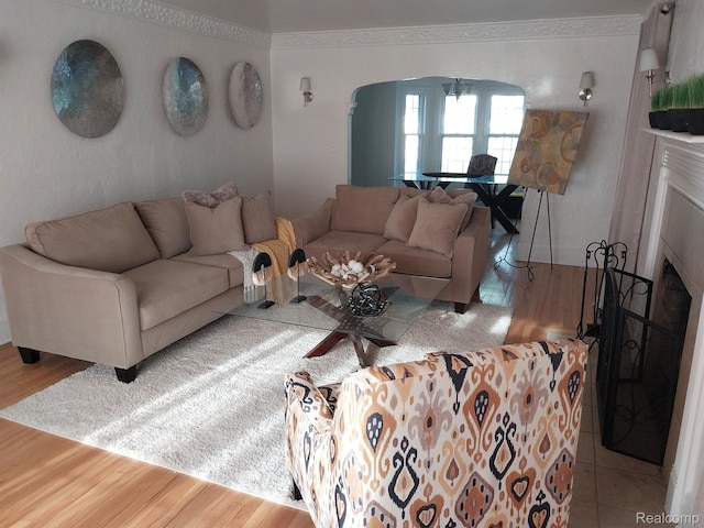 16834 Muirland St, Detroit, MI 48221 - living room with arched walkways and wood finished floors