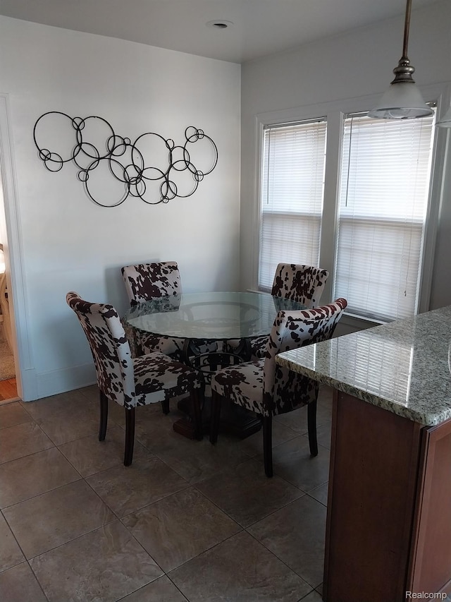 16834 Muirland St, Detroit, MI 48221 - dining area featuring dark tile patterned flooring