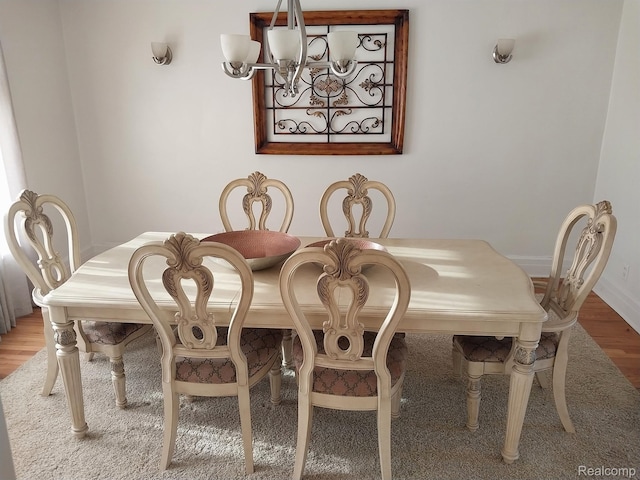 16834 Muirland St, Detroit, MI 48221 - dining space featuring a chandelier and wood finished floors
