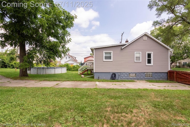 29046 S Wesley Ave, Flat Rock, MI 48134 - view of side of home with an outdoor pool