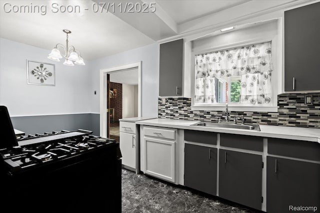 21840 N Tuller Ct, Southfield, MI 48076 - kitchen with gas stove, backsplash, and light countertops