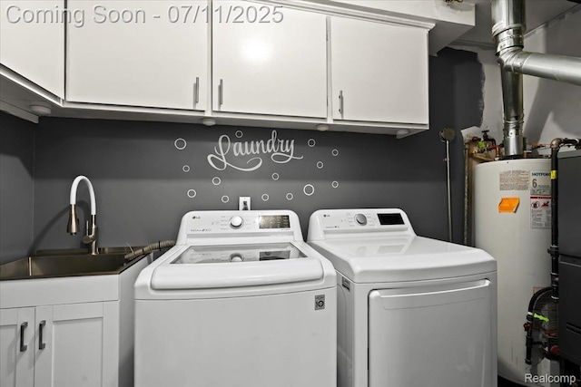 21840 N Tuller Ct, Southfield, MI 48076 - laundry room featuring washer and dryer, gas water heater, and cabinet space