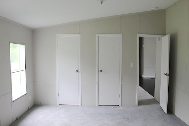 5249 Lapeer Rd, Burton, MI 48509 - unfurnished bedroom with carpet floors and vaulted ceiling
