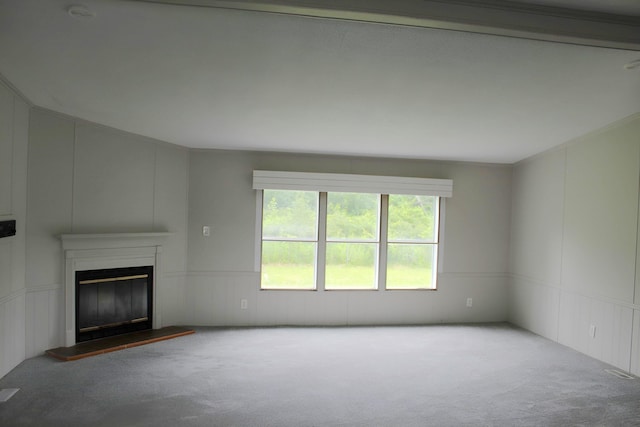 5249 Lapeer Rd, Burton, MI 48509 - unfurnished living room featuring a decorative wall, carpet, and a glass covered fireplace