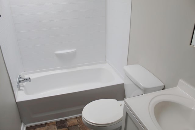 5249 Lapeer Rd, Burton, MI 48509 - bathroom with stone finish floors, vanity, and  shower combination