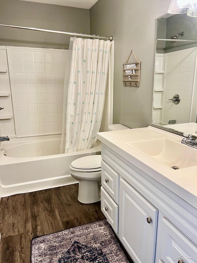 4865 Cactus Dr, Saginaw, MI 48603 - full bath featuring vanity, shower / bath combo with shower curtain, and wood finished floors