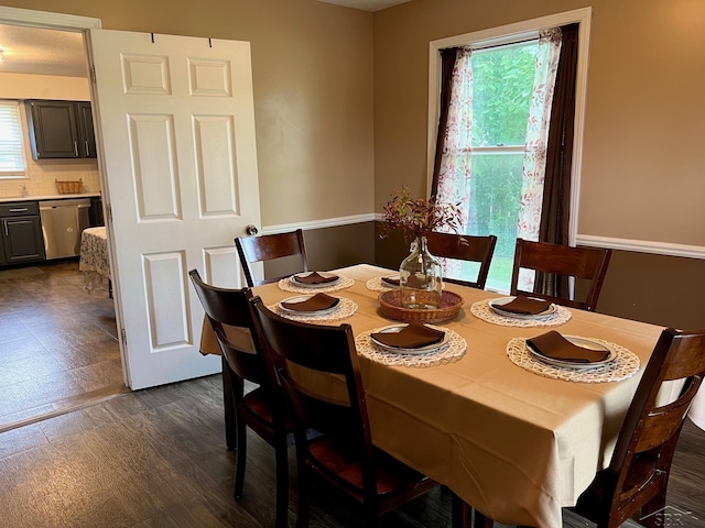 4865 Cactus Dr, Saginaw, MI 48603 - dining space with dark floors
