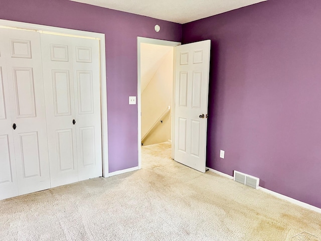 4865 Cactus Dr, Saginaw, MI 48603 - unfurnished bedroom with carpet floors and a closet