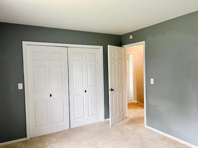 4865 Cactus Dr, Saginaw, MI 48603 - unfurnished bedroom featuring carpet and a closet