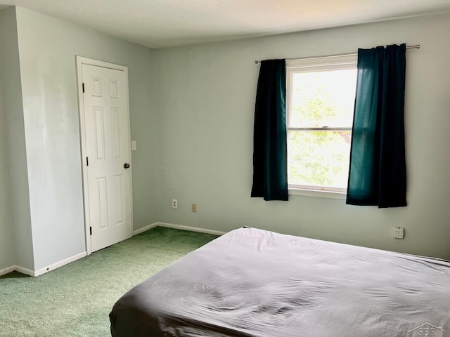 4865 Cactus Dr, Saginaw, MI 48603 - carpeted bedroom with baseboards