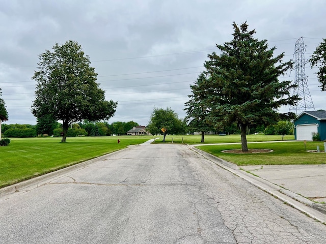 4865 Cactus Dr, Saginaw, MI 48603 - view of asphalt street featuring curbs