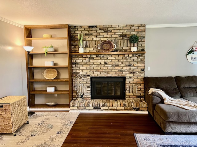 4865 Cactus Dr, Saginaw, MI 48603 - living room featuring crown molding, wood finished floors, and a fireplace