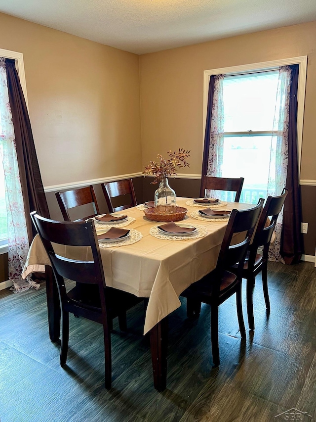 4865 Cactus Dr, Saginaw, MI 48603 - dining area with baseboards and wood finished floors
