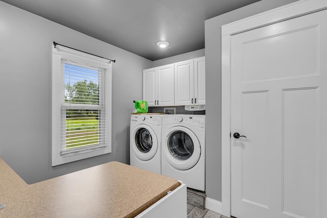 4825 Walz Rd, Jackson, MI 49201 - laundry area featuring cabinet space and washer and dryer