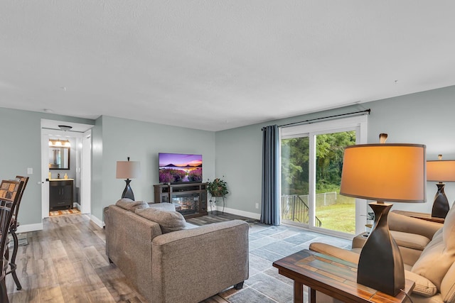 4825 Walz Rd, Jackson, MI 49201 - living area featuring baseboards and wood finished floors