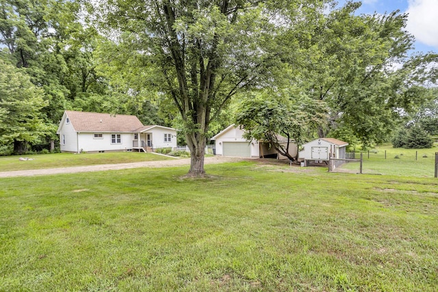 4825 Walz Rd, Jackson, MI 49201 - view of front of property featuring an outbuilding, a detached garage, and crawl space